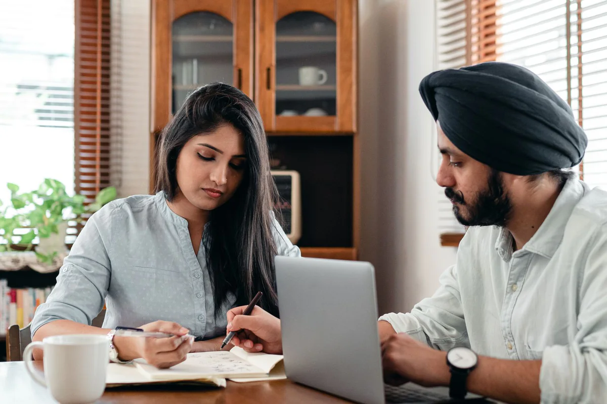 The team reviewing a client's numbers