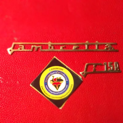 LEG SHIELD LAMBRETTA LI 150 BRASS LOGO