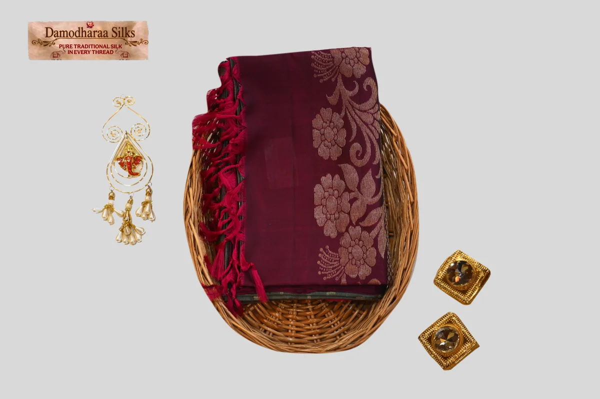Elegant Wine Maroon Silk Saree with Floral Zari Design & Tassel Pallu