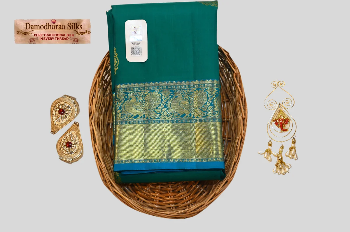 Elegant Peacock Green Silk Saree with Royal Blue Zari Border