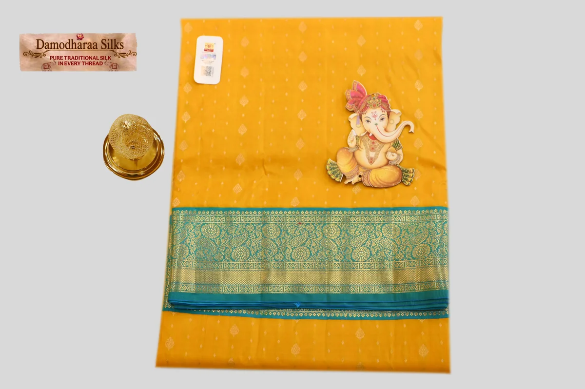 Golden Yellow Silk Saree with Elegant Teal Blue Zari Border