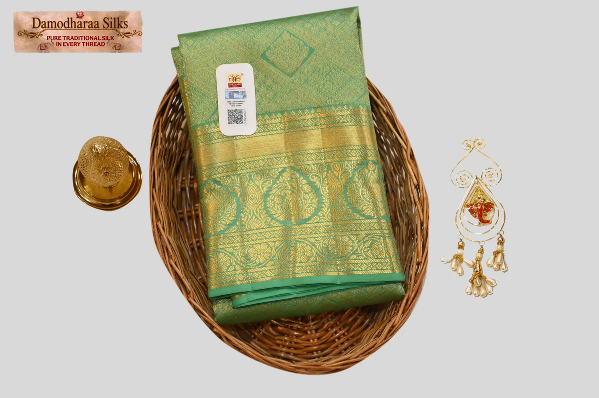 Elegant Sea Green Silk Saree with Gold Zari Checks & Ornate Border