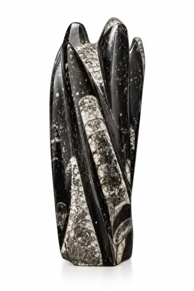 Close-up product view of the Kuber Stone Tower against a clean white background, highlighting its polished dark surface, natural mineral patterns and unique mul