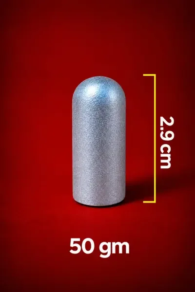 Close-up of the 50 Gram Parad Shivling, showing its cylindrical form, metallic finish and 2.9 cm / 29 mm height.