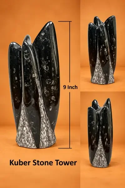 Kuber Stone Tower displayed from multiple angles, showcasing its natural dark stone texture, layered pointed formation and distinctive grey mineral patterns. Th