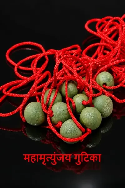 Mah Mrityunjay Gutika collection with natural green sacred beads and red threads arranged on a glossy black reflective surface.