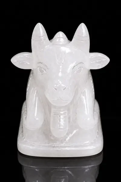White Sphatik Nandi Ji with black background highlighting its natural Quartz Crystal body and finely carved details.