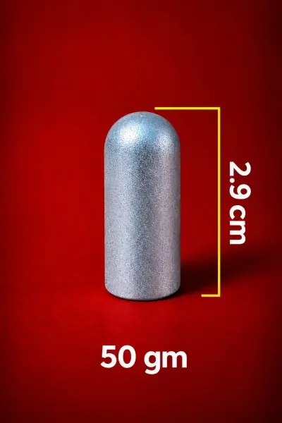 Close-up of the 50 Gram Parad Shivling, showcasing its cylindrical shape, metallic finish and 2.9 cm / 29 mm height.