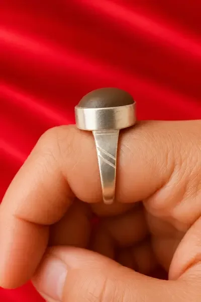 Side view of the Navapashanam Ring highlighting its silver band, raised bead setting and detailed craftsmanship.