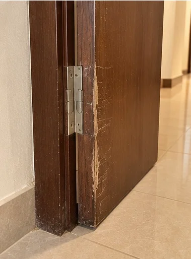 Scuffs and Damage on Door Frame