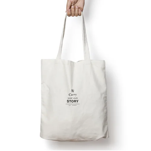 GetPrintX white cotton canvas zipper tote mockup, with Carry your own story in black and a small K&Y monogram.