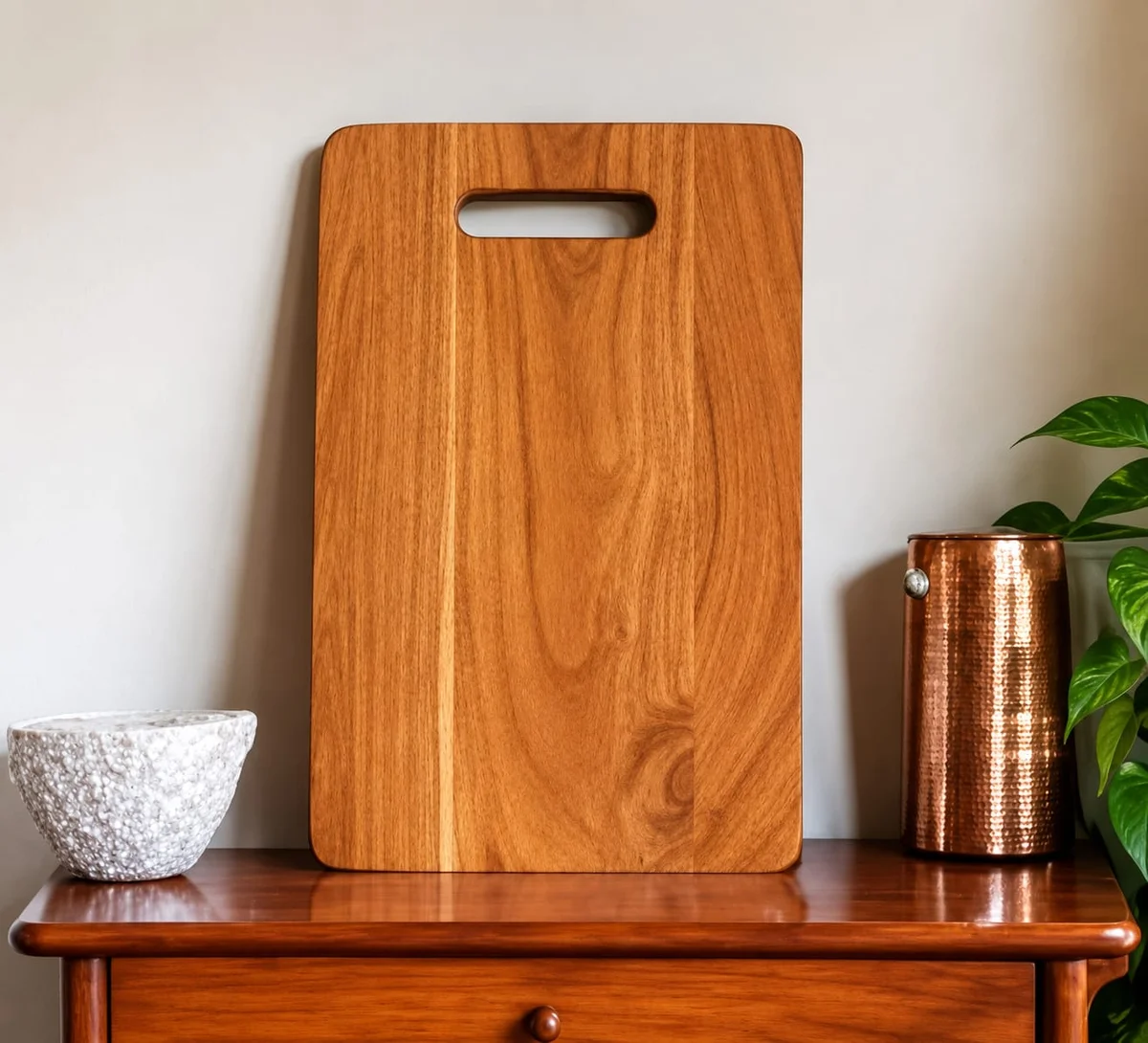 Durable rectangle wood cutting board standing on a kitchen counter