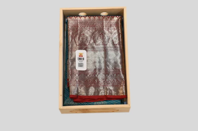 Elegant Silver Zari Banarasi Silk Saree with Rich Red Border