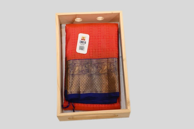 Elegant Coral Orange Banarasi Silk Saree with Royal Blue Zari Border