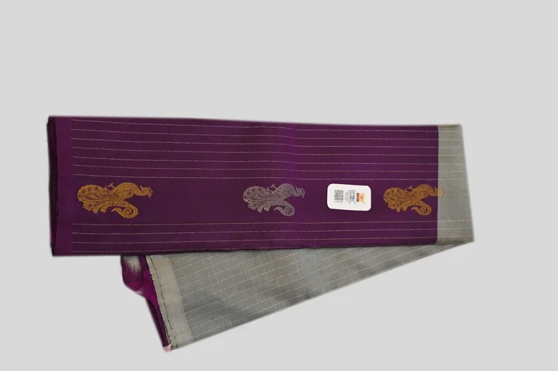 Royal Purple Silk Saree with Silver Border and Peacock Motifs
