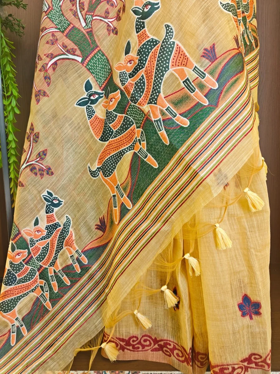 Premium Soft Muga Cotton Saree with Hiran & Tree woven pallu, all-over floral weaving, contrast border, fancy tassels + running blouse piece