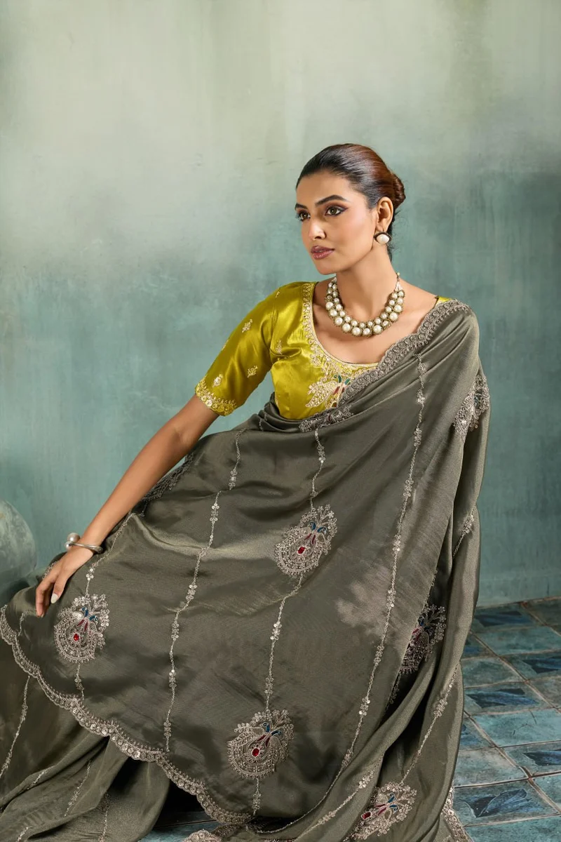 Giraffe Saree with rich texture, fluid drape, intricate Butta embroidery, handwork & stonework + Royal Makhmal Satin blouse in contrasting shades | Occasion: Pa