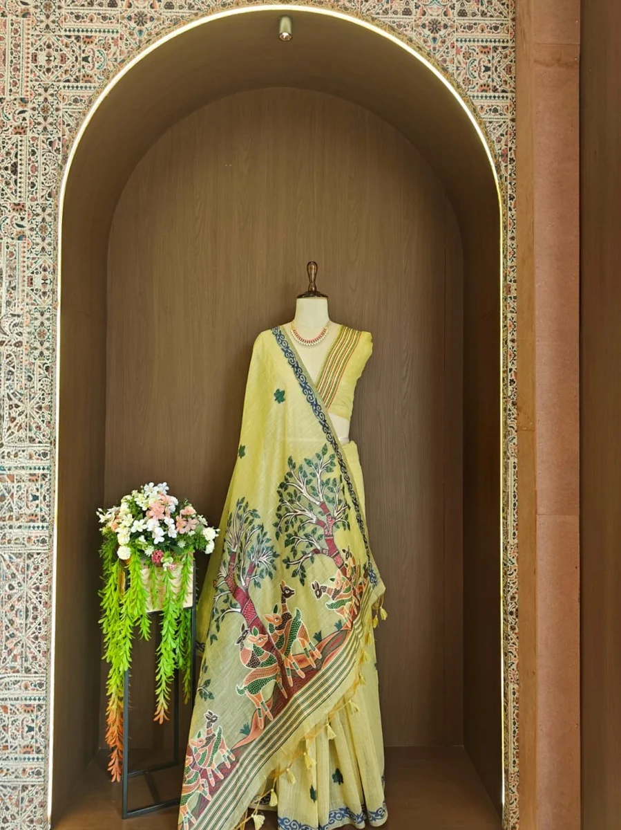 Premium Soft Muga Cotton Saree with Hiran & Tree woven pallu, all-over floral weaving, contrast border, fancy tassels + running blouse piece
