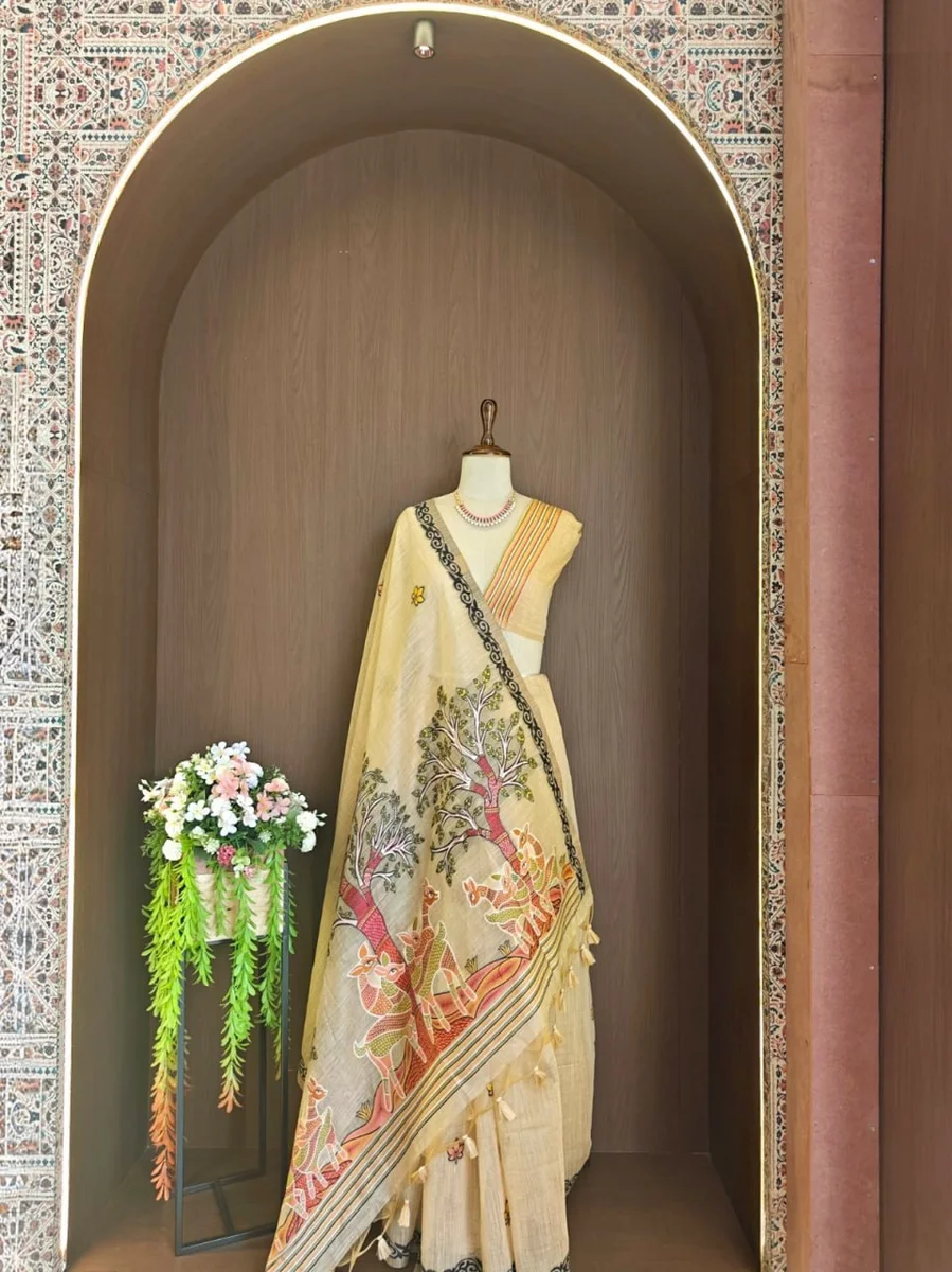 Premium Soft Muga Cotton Saree with Hiran & Tree woven pallu, all-over floral weaving, contrast border, fancy tassels + running blouse piece