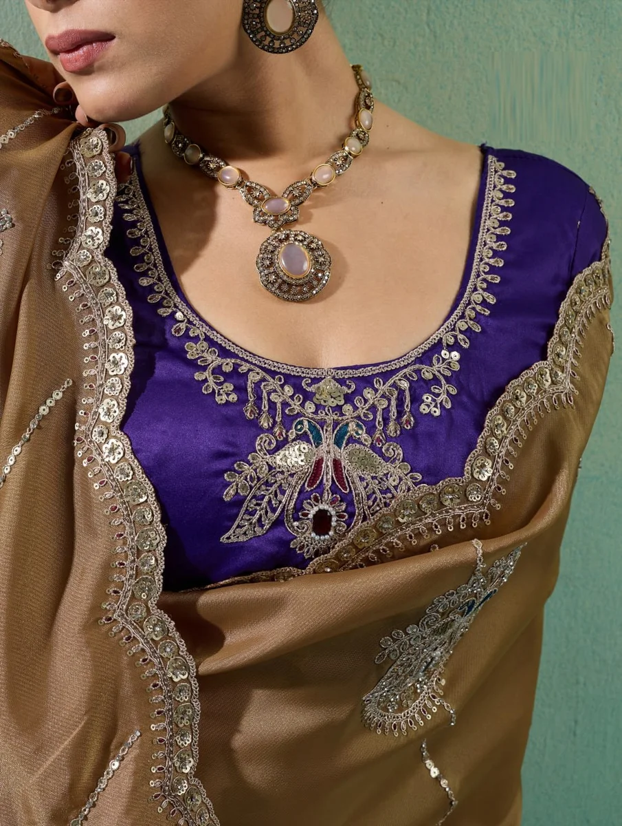 Giraffe Saree with rich texture, fluid drape, intricate Butta embroidery, handwork & stonework + Royal Makhmal Satin blouse in contrasting shades | Occasion: Pa