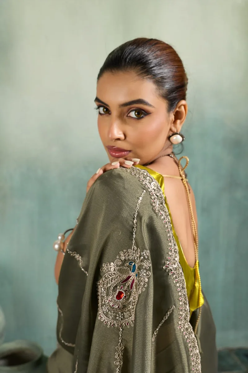Giraffe Saree with rich texture, fluid drape, intricate Butta embroidery, handwork & stonework + Royal Makhmal Satin blouse in contrasting shades | Occasion: Pa