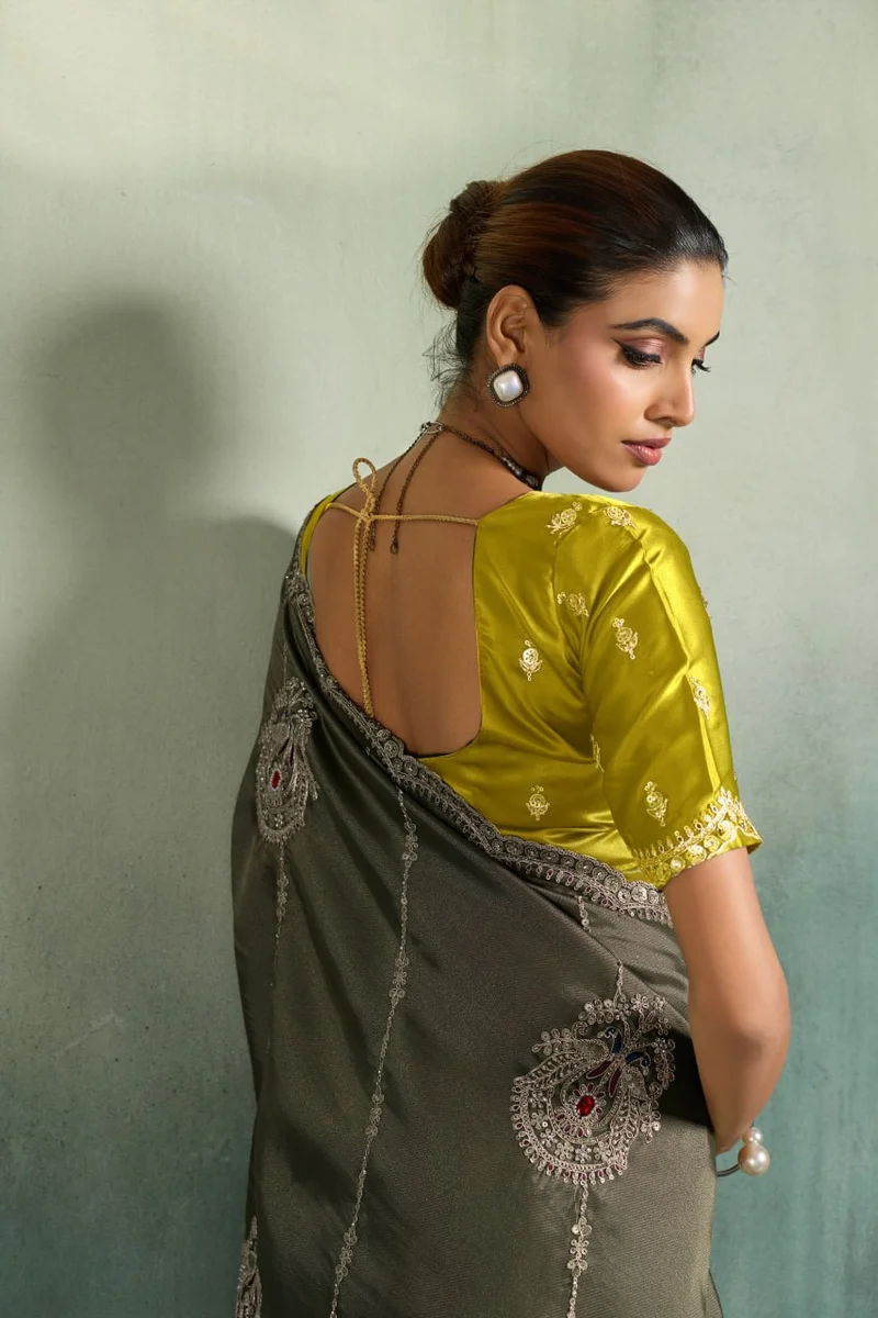 Giraffe Saree with rich texture, fluid drape, intricate Butta embroidery, handwork & stonework + Royal Makhmal Satin blouse in contrasting shades | Occasion: Pa