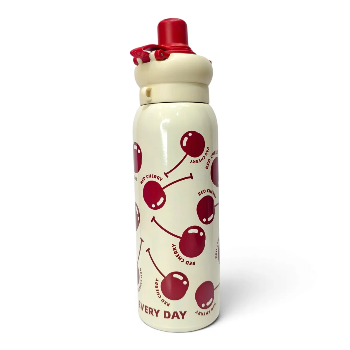 Product image showing the red cherry kids water bottle standing upright against a white background. The cream-coloured bottle is covered with playful red cherry