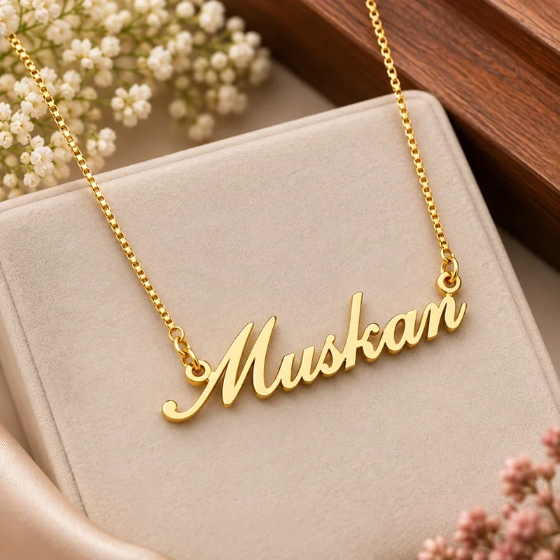 IGIFTZI Simple Style Gold-Tone Name Necklace with Muskan cursive pendant on beige jewellery display.